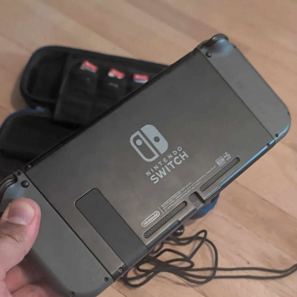 Nintendo Switch with Added Joy cons, Games, Case And Accessories